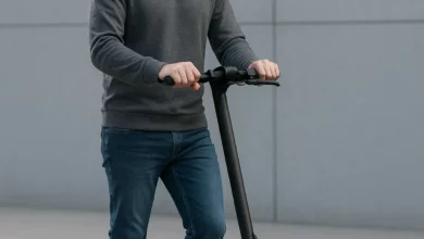 electric scooter rider standing still