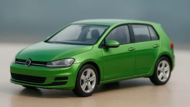 green toy car on table