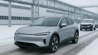 Electric vehicle manufacturing factory in winter.